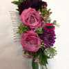 Pink and purple floral hair comb with roses and small blooms