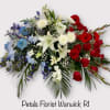 Red, white, and blue floral spray with roses and lilies