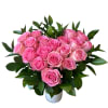 19 light pink roses designed in a heart shape with greens in
