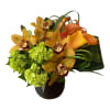 Orange orchids and green hydrangeas in a dark vase