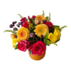 Mixed bouquet of pink roses, yellow gerberas, and yellow calla lilies in a vase