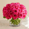 Pink rose bouquet in a clear glass vase