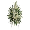 Tall white floral standing spray on an easel