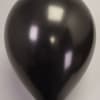 Single black balloon on a plain background