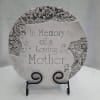 Decorative memorial plaque reading "In Memory of a Loving Mother" on a stand