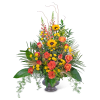 Tall arrangement of orange roses and yellow sunflowers in a gray vase