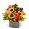 Sunflowers, orange roses, and carnations in a wooden box
