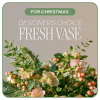 Fresh vase arrangement with pink and cream flowers and greenery