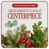 Holiday table centerpiece with evergreen branches and red berries