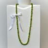 Celebrate tradition and timeless island beauty with the Single Berry Lei, a