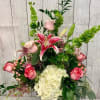 Tall bouquet with pink roses, white hydrangea, and a pink lily