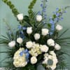 A alter piece style arrangment of high end white, blue and greens