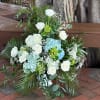 An alter style piece arrangment for a service in white, green and