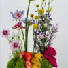 Fun, whimsical and bright are what you get with this beautiful floral