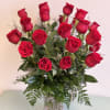 Bouquet of red roses in a clear glass vase