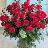 Bouquet of red roses in a clear glass vase
