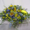 Large mixed bouquet with yellow sunflowers and blue flowers