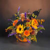 Halloween floral arrangement in an orange container with black house cutouts