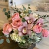 A stunning array of lush hydrangeas, premium pink Expression garden roses, and