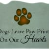 Paw print memorial plaque with the words Dogs Leave Paw Prints On Our Hearts