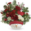 Christmas bouquet in a snowman container with red and white roses
