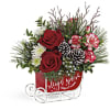 Red roses and white flowers in a red sleigh-shaped container