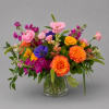 Colorful mixed bouquet in a clear glass vase