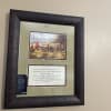 Framed wall art with a hunting scene and a Bible verse