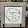 Framed sign with butterflies and the words "butterflies appear when angels are near"