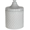 White lidded ceramic jar with a diamond pattern