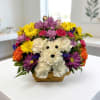 Basket arrangement with a white teddy bear made of flowers and colorful blooms
