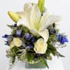 Capture the serene beauty of a starlit night. This elegant arrangement features