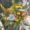 Dads deserve flowers too! This arrangement is sure to put a smile