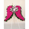 Large pink rose heart-shaped standing arrangement on an easel