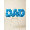 Blue floral letters spelling DAD on a wooden easel