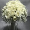 White rose bouquet in a glass vase