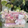 Newborn baby wooden basket with chocolates flowers and teddy bear. 

If you