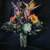 Colorful mixed bouquet in a clear glass vase