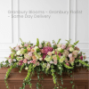 Our Living Legacy Casket cover is a full, garden-style casket spray designed
