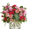 Bright &amp; bold mix of roses, alstroemeria, carnations &amp; a succulent to