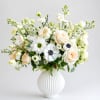 Spread love with this stunning bouquet, full of heartwarming seasonal blooms. PLEASE