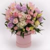 Let the soft, romantic hues of pink and lavender transport you to