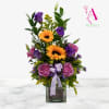 Sunflowers and lavender-pink roses create an immediate lift in this flower arrangement