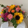 Enjoy this bright and sweet arrangement made with the freshest flowers available!