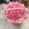 Large bouquet of pink roses with a birthday ribbon