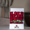 Box of red roses with a clear front window