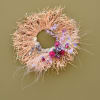 Say "aloha" with this beautiful handmade wreath featuring preserved flowers.  

Size: