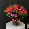 A lovely bowl of colorful roses brightens and lifts any room (and