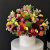Something you can't have too much of-Flowers.....This bright and colorful arrangement is
