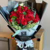24 Red roses with eucalyptus leaf and seeded eucalyptus in our famous